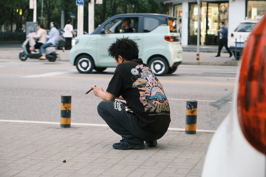 person holding CBD oil dropper with calm lifestyle setting